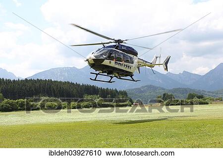 "Police Helicopter EC 145 Eurocopter, behind the Allgau Alps, near Fussen, Ostallgau, Allgau, Upper Swabia, Swabia, Bavaria, Germany, Europe" View Large Photo Image Stock Image - "Police Helicopter EC 145 Eurocopter, behind the Allgau Alps, near Fussen, Ostallgau, Allgau, Upper Swabia, Swabia, Bavaria, Germany, Europe". Fotosearch