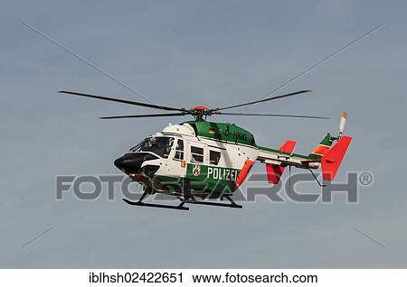 Police helicopter Hummel 9 in flight near Duesseldorf Airport, North Rhine-Westphalia, Germany, Europe View Large Photo Image Stock Image - Police helicopter Hummel 9 in flight near Duesseldorf Airport, North Rhine-Westphalia, Germany, Europe. Fotosearch