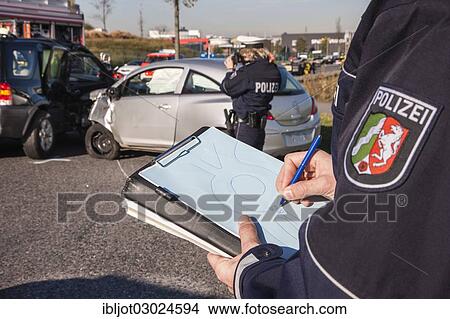 "Police officer sketching the accident scene, Germany, Europe" View Large Photo Image Picture - "Police officer sketching the accident scene, Germany, Europe". Fotosearch