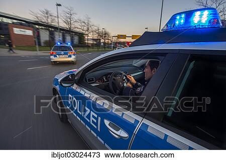 "Police patrol car in an emergency operation, with blue lights and sirens, Germany, Europe" View Large Photo Image Stock Image - "Police patrol car in an emergency operation, with blue lights and sirens, Germany, Europe". Fotosearch