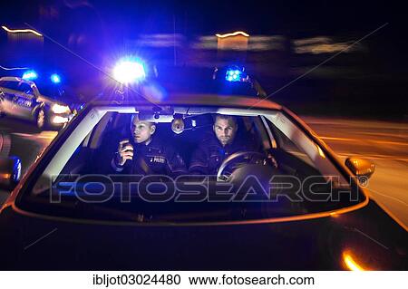 "Police patrol car in an emergency operation, with blue lights and sirens, Germany, Europe" View Large Photo Image Stock Image - "Police patrol car in an emergency operation, with blue lights and sirens, Germany, Europe". Fotosearch