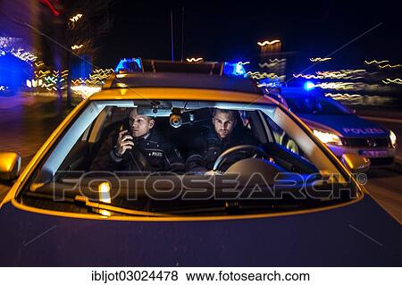 "Police patrol car in an emergency operation, with blue lights and sirens, Germany, Europe" View Large Photo Image Stock Photo - "Police patrol car in an emergency operation, with blue lights and sirens, Germany, Europe". Fotosearch