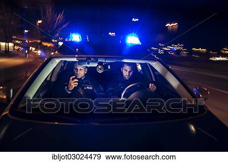 "Police patrol car in an emergency operation, with blue lights and sirens, Germany, Europe" View Large Photo Image Stock Photo - "Police patrol car in an emergency operation, with blue lights and sirens, Germany, Europe". Fotosearch