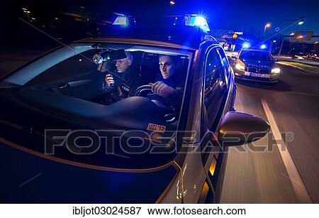 "Police patrol car in an emergency operation, with blue lights and sirens, Germany, Europe" View Large Photo Image Stock Photo - "Police patrol car in an emergency operation, with blue lights and sirens, Germany, Europe". Fotosearch