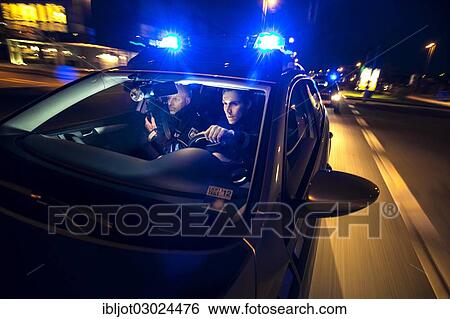 "Police patrol car in an emergency operation, with blue lights and sirens, Germany, Europe" View Large Photo Image Stock Photograph - "Police patrol car in an emergency operation, with blue lights and sirens, Germany, Europe". Fotosearch
