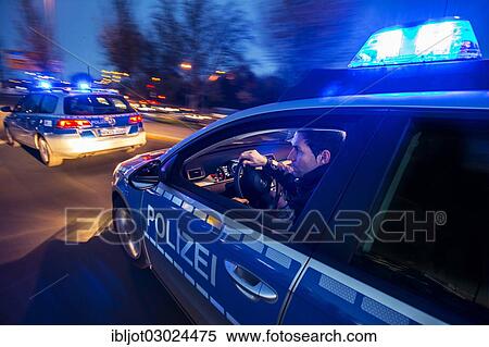 "Police patrol car in an emergency operation, with blue lights and sirens, Germany, Europe" View Large Photo Image Stock Photography - "Police patrol car in an emergency operation, with blue lights and sirens, Germany, Europe". Fotosearch