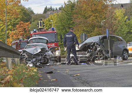 Policeman marking an accident site with a spray can, fatal accident on the L 299 highway, Lindlar, North Rhine-Westphalia, Germany, Europe View Large Photo Image Stock Photo - Policeman marking an accident site with a spray can, fatal accident on the L 299 highway, Lindlar, North Rhine-Westphalia, Germany, Europe. Fotosearch