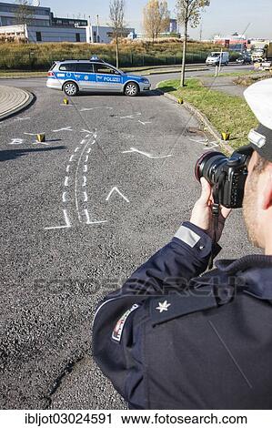 "Policeman taking pictures on the scene of a traffic accident, Germany, Europe" View Large Photo Image Stock Image - "Policeman taking pictures on the scene of a traffic accident, Germany, Europe". Fotosearch