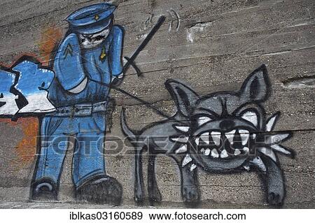 "Policeman with a tough dog, graffiti, Koudekerke, Zeeland province, The Netherlands, Europe" View Large Photo Image Stock Photo - "Policeman with a tough dog, graffiti, Koudekerke, Zeeland province, The Netherlands, Europe". Fotosearch