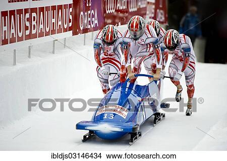 "Polish 4-man bobsleigh team, with Dawid Kupczyk, Daniel Zalewski, Pawel Mroz, Niewiara Marcin, 4-man Bobsleigh World Cup, St. Moritz, Engadin, Graubunden, Switzerland, Europe" View Large Photo Image Picture - "Polish 4-man bobsleigh team, with Dawid Kupczyk, Daniel Zalewski, Pawel Mroz, Niewiara Marcin, 4-man Bobsleigh World Cup, St. Moritz, Engadin, Graubunden, Switzerland, Europe". Fotosearch