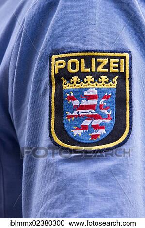 "Polizei, embroidered crest on the shirt of a policeman, Germany, Europe" View Large Photo Image Stock Image - "Polizei, embroidered crest on the shirt of a policeman, Germany, Europe". Fotosearch