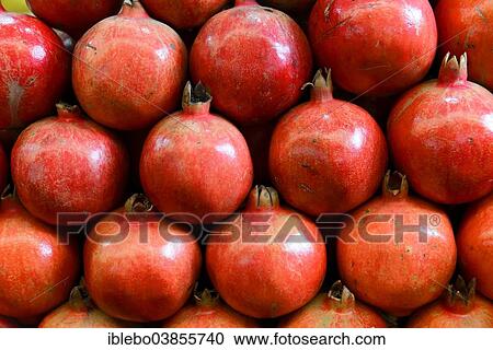Stock Image - "Pomegranates (Punica granatum) for sale, Mysore, Karnataka, South India, India, Asia". Fotosearch