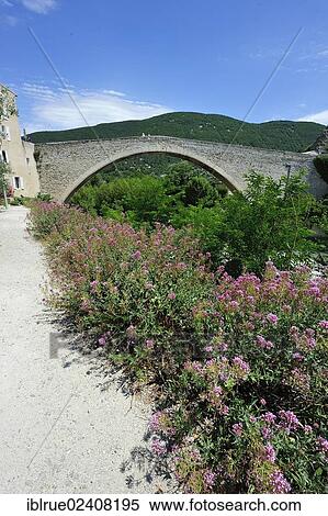 "Pont de Nyons, medieval bridge over the Eygues River, arch span 40. 5m, Nyons, Departement Drome, Region Rhone-Alpes, France, Europe" View Large Photo Image Stock Photography - "Pont de Nyons, medieval bridge over the Eygues River, arch span 40. 5m, Nyons, Departement Drome, Region Rhone-Alpes, France, Europe". Fotosearch