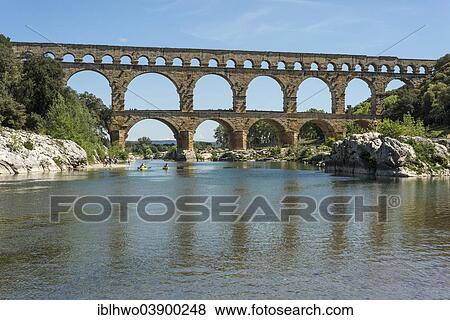 "Pont du Gard, Roman aqueduct, UNESCO World Heritage Site, over the Gardon River, Vers-Pont-du-Gard, Departement Gard, Languedoc-Roussillon, France, Europe" View Large Photo Image Stock Photo - "Pont du Gard, Roman aqueduct, UNESCO World Heritage Site, over the Gardon River, Vers-Pont-du-Gard, Departement Gard, Languedoc-Roussillon, France, Europe". Fotosearch