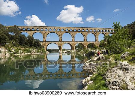 "Pont du Gard, Roman aqueduct, UNESCO World Heritage Site, over the Gardon River, Vers-Pont-du-Gard, Departement Gard, Languedoc-Roussillon, France, Europe" View Large Photo Image Stock Photo - "Pont du Gard, Roman aqueduct, UNESCO World Heritage Site, over the Gardon River, Vers-Pont-du-Gard, Departement Gard, Languedoc-Roussillon, France, Europe". Fotosearch