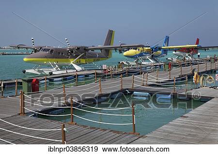 Stock Photo - "Pontoon with hydroplanes, De Havilland Canada DHC-6 300 Twin Otter, Male International Airport, Hulhule, Maldives, Asia". Fotosearch