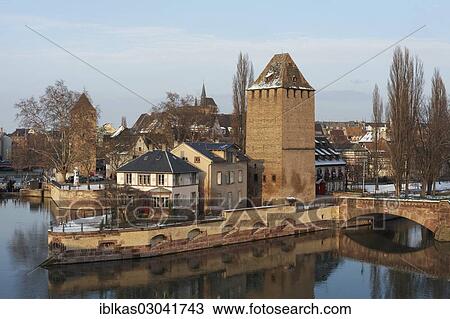 "Ponts couverts or covered bridges over the Ill River and tower of the city wall, Petite-France, Strasbourg, Departement Bas-Rhin, Alsace, France, Europe" View Large Photo Image Stock Image - "Ponts couverts or covered bridges over the Ill River and tower of the city wall, Petite-France, Strasbourg, Departement Bas-Rhin, Alsace, France, Europe". Fotosearch