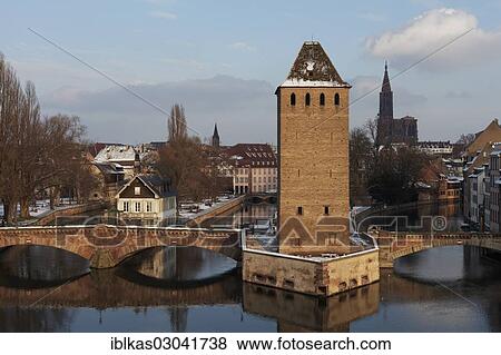 "Ponts couverts or covered bridges over the Ill River and tower of the city wall, Petite-France, Strasbourg, Departement Bas-Rhin, Alsace, France, Europe" View Large Photo Image Stock Photo - "Ponts couverts or covered bridges over the Ill River and tower of the city wall, Petite-France, Strasbourg, Departement Bas-Rhin, Alsace, France, Europe". Fotosearch