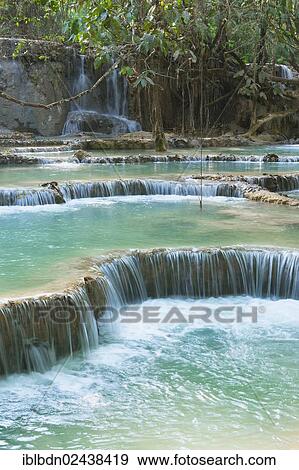 Stock Photo - "Pool and waterfall in the Tat Kuang Si waterfall system near Luang Prabang in Laos, Southeast Asia". Fotosearch