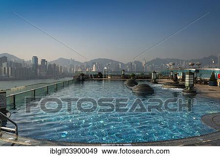 "Pool on the roof of the Harbour Grand Hotel, skyline at the back, Kowloon, Hong Kong, China, Asia" View Large Photo Image Stock Photo - "Pool on the roof of the Harbour Grand Hotel, skyline at the back, Kowloon, Hong Kong, China, Asia". Fotosearch