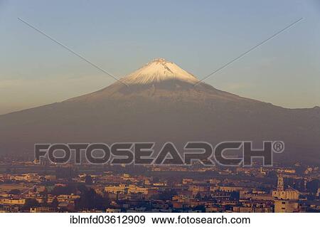 "Popocatepetl volcano with the city of Cholula in early morning light, Cholula, Puebla, Mexico, North America" View Large Photo Image Stock Photo - "Popocatepetl volcano with the city of Cholula in early morning light, Cholula, Puebla, Mexico, North America". Fotosearch