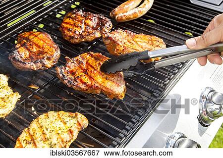 "Pork steaks on a gas grill, Germany, Europe" View Large Photo Image Stock Photo - "Pork steaks on a gas grill, Germany, Europe". Fotosearch
