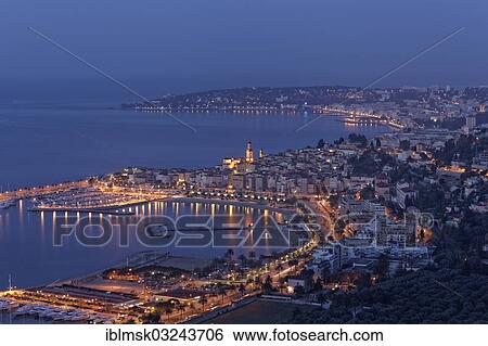 "Port and bay of Menton at the blue hour, Menton, French Riviera, Alpes-Maritimes, Provence-Alpes-Cote d? ÇÖAzur, France, Europe" View Large Photo Image Stock Photograph - "Port and bay of Menton at the blue hour, Menton, French Riviera, Alpes-Maritimes, Provence-Alpes-Cote d? ÇÖAzur, France, Europe". Fotosearch