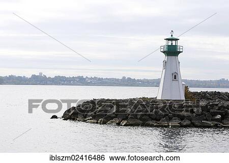 Stock Photograph - Port and lighthouse of Prescott, Ontario, Canada, North America. Fotosearch