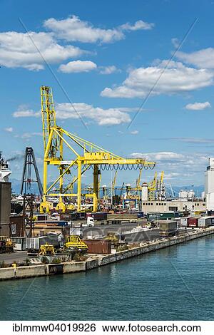 Stock Photograph - "Port crane with containers, cargo port of Livorno, Tuscany, Italy, Europe". Fotosearch