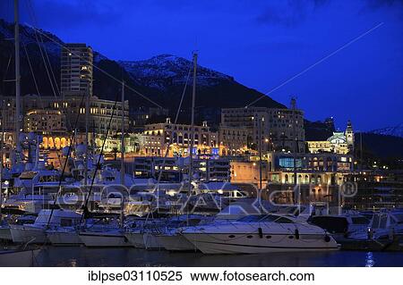 "Port Hercule, Monte-Carlo, snow-capped mountains at back, in the evening, dusk, Furstentum Monaco, Monaco, Europe" View Large Photo Image Stock Photography - "Port Hercule, Monte-Carlo, snow-capped mountains at back, in the evening, dusk, Furstentum Monaco, Monaco, Europe". Fotosearch
