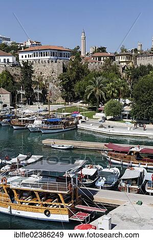 "Port in the historic town centre of Antalya, looking towards Yivli Minare Mosque, Kaleici, Turkish Riviera, Turkey, Asia" View Large Photo Image Stock Photo - "Port in the historic town centre of Antalya, looking towards Yivli Minare Mosque, Kaleici, Turkish Riviera, Turkey, Asia". Fotosearch