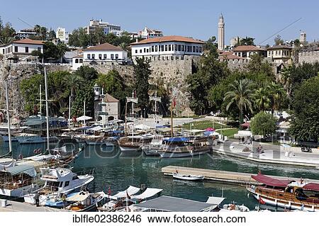 "Port in the historic town centre of Antalya, looking towards Yivli Minare Mosque, Kaleici, Turkish Riviera, Turkey, Asia" View Large Photo Image Stock Photograph - "Port in the historic town centre of Antalya, looking towards Yivli Minare Mosque, Kaleici, Turkish Riviera, Turkey, Asia". Fotosearch