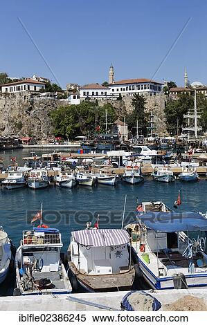 "Port in the historic town centre of Antalya, looking towards Yivli Minare Mosque, Kaleici, Turkish Riviera, Turkey, Asia" View Large Photo Image Stock Photography - "Port in the historic town centre of Antalya, looking towards Yivli Minare Mosque, Kaleici, Turkish Riviera, Turkey, Asia". Fotosearch