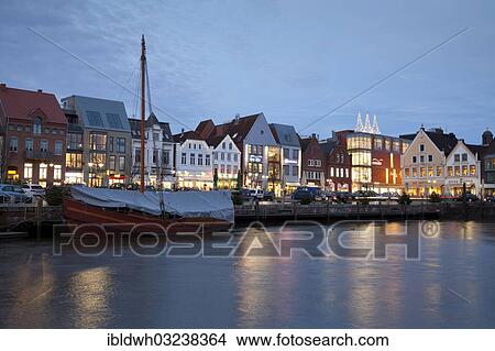 "Port of Husum during the blue hour, Husum, North Frisia, Schleswig-Holstein, Germany, Europe" View Large Photo Image Picture - "Port of Husum during the blue hour, Husum, North Frisia, Schleswig-Holstein, Germany, Europe". Fotosearch