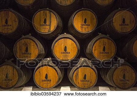 "Port wine barrels, wine cellar of the Sandeman Winery """"Sandeman Porto Wine Cellars"""", Vila Nova de Gaia, District of Porto, Portugal, Europe" View Large Photo Image Stock Photo - "Port wine barrels, wine cellar of the Sandeman Winery """"Sandeman Porto Wine Cellars"""", Vila Nova de Gaia, District of Porto, Portugal, Europe". Fotosearch