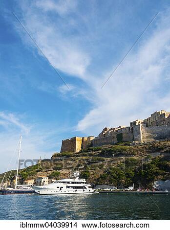 Picture - "Port with castle, Bonifacio, Corsica, France, Europe". Fotosearch