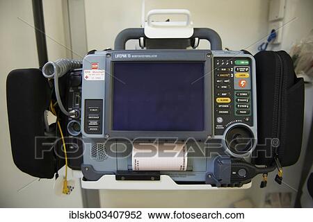 Stock Image - "Portable electrocardiogram with a defibrillator in an ambulance, Lehel, Munich, Upper Bavaria, Bavaria, Germany, Europe". Fotosearch