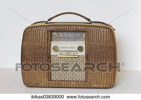 Stock Image - "Portable radio-gramophone of the Akkord Radio brand from 1945, Picnic model, with a sliding door, opened, Radio Museum Duisburg, North Rhine-Westphalia, Germany, Europe". Fotosearch