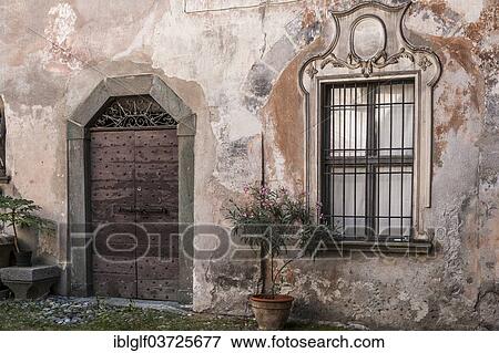 Stock Photo - "Portal and window, Palazzo Merizzi, Tirano, Sondrio province, Lombardy, Italy, Europe". Fotosearch
