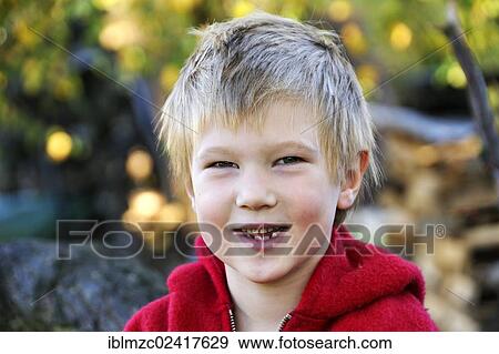 Stock Photo - Portrait of a blond boy smiling, five years old, Othenstorf, Mecklenburg-Western Pomerania, Germany, Europe. Fotosearch