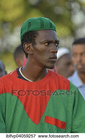 Stock Photo - "Portrait of a dervish in front of the Hamed al-Nile grave, at the weekly dervish ceremony, Hamed al-Nile cemetery, Kharthoum, Sudan, Africa". Fotosearch