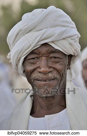 "Portrait of a dervish in front of the Hamed al-Nile grave, at the weekly dervish ceremony, Hamed al-Nile cemetery, Kharthoum, Sudan, Africa" View Large Photo Image Stock Photography - "Portrait of a dervish in front of the Hamed al-Nile grave, at the weekly dervish ceremony, Hamed al-Nile cemetery, Kharthoum, Sudan, Africa". Fotosearch