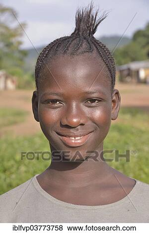 "Portrait of a girl in Waiima, Kono District, Sierra Leone, Africa" View Large Photo Image Stock Photo - "Portrait of a girl in Waiima, Kono District, Sierra Leone, Africa". Fotosearch