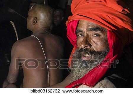 "Portrait of a guru guiding the initiation of new sadhus, during Kumbha Mela festival, Allahabad, Uttar Pradesh, India, Asia" View Large Photo Image Stock Image - "Portrait of a guru guiding the initiation of new sadhus, during Kumbha Mela festival, Allahabad, Uttar Pradesh, India, Asia". Fotosearch