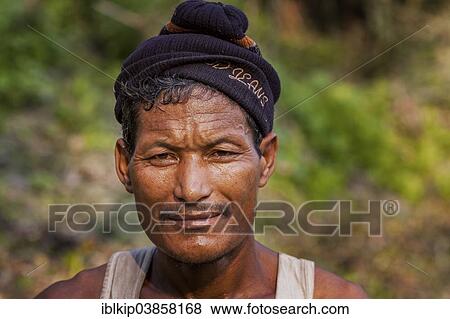 "Portrait of a man from the Mishing tribe, Majuli, Assam, India, Asia" View Large Photo Image Stock Photo - "Portrait of a man from the Mishing tribe, Majuli, Assam, India, Asia". Fotosearch