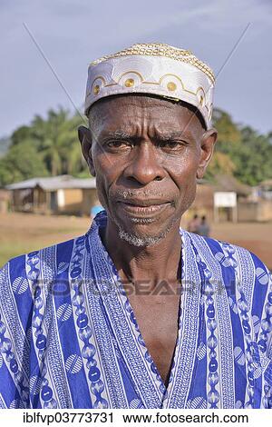 "Portrait of a man in Muslim dress, Waiima, Kono District, Sierra Leone, Africa" View Large Photo Image Stock Image - "Portrait of a man in Muslim dress, Waiima, Kono District, Sierra Leone, Africa". Fotosearch