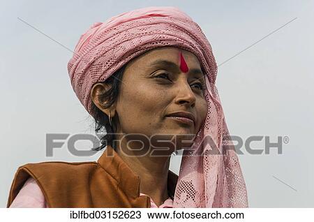 "Portrait of a Sadhvi, holy woman, at the Sangam, the confluence of the rivers Ganges, Yamuna and Saraswati, during Kumbha Mela festival, Allahabad, Uttar Pradesh, India, Asia" View Large Photo Image Stock Image - "Portrait of a Sadhvi, holy woman, at the Sangam, the confluence of the rivers Ganges, Yamuna and Saraswati, during Kumbha Mela festival, Allahabad, Uttar Pradesh, India, Asia". Fotosearch