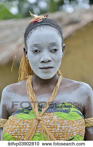 Stock Image - "Portrait of a sick woman during a healing dance, healing ceremony, Nkala, Bandundu Province, Democratic Republic of the Congo". Fotosearch