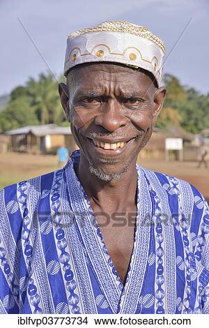"Portrait of a smiling man in Muslim dress, Muslim, Waiima, Kono District, Sierra Leone, Africa" View Large Photo Image Picture - "Portrait of a smiling man in Muslim dress, Muslim, Waiima, Kono District, Sierra Leone, Africa". Fotosearch
