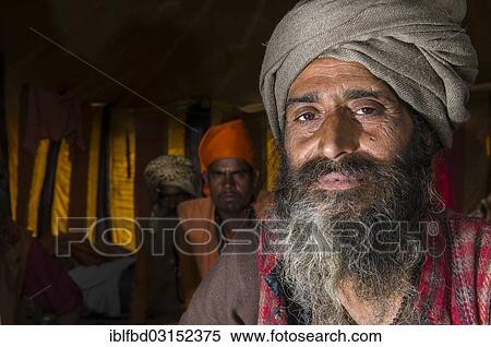 "Portrait of a Udaisin Sadhu, holy man, at the Sangam, the confluence of the rivers Ganges, Yamuna and Saraswati, during Kumbha Mela festival, Allahabad, Uttar Pradesh, India, Asia" View Large Photo Image Stock Photography - "Portrait of a Udaisin Sadhu, holy man, at the Sangam, the confluence of the rivers Ganges, Yamuna and Saraswati, during Kumbha Mela festival, Allahabad, Uttar Pradesh, India, Asia". Fotosearch